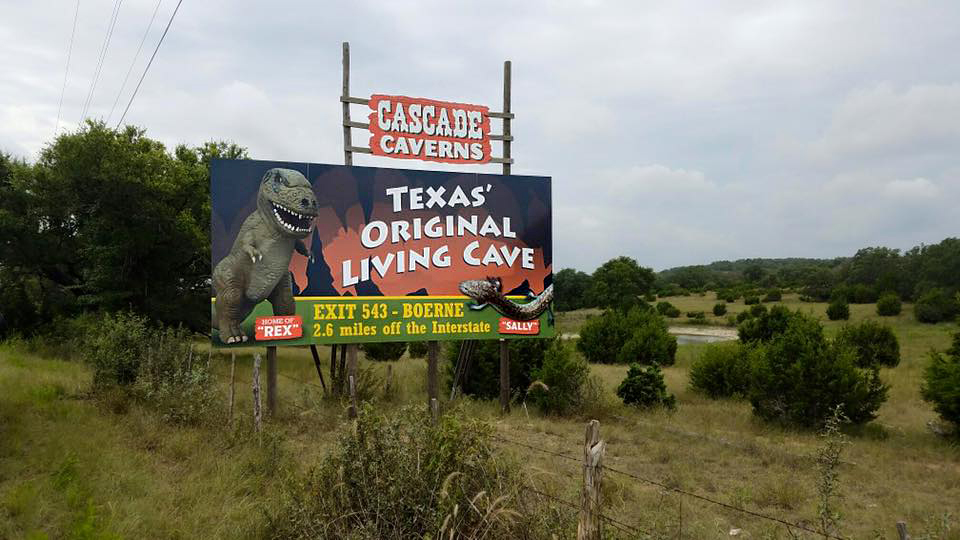 site-signs-cascade-caverns-rex