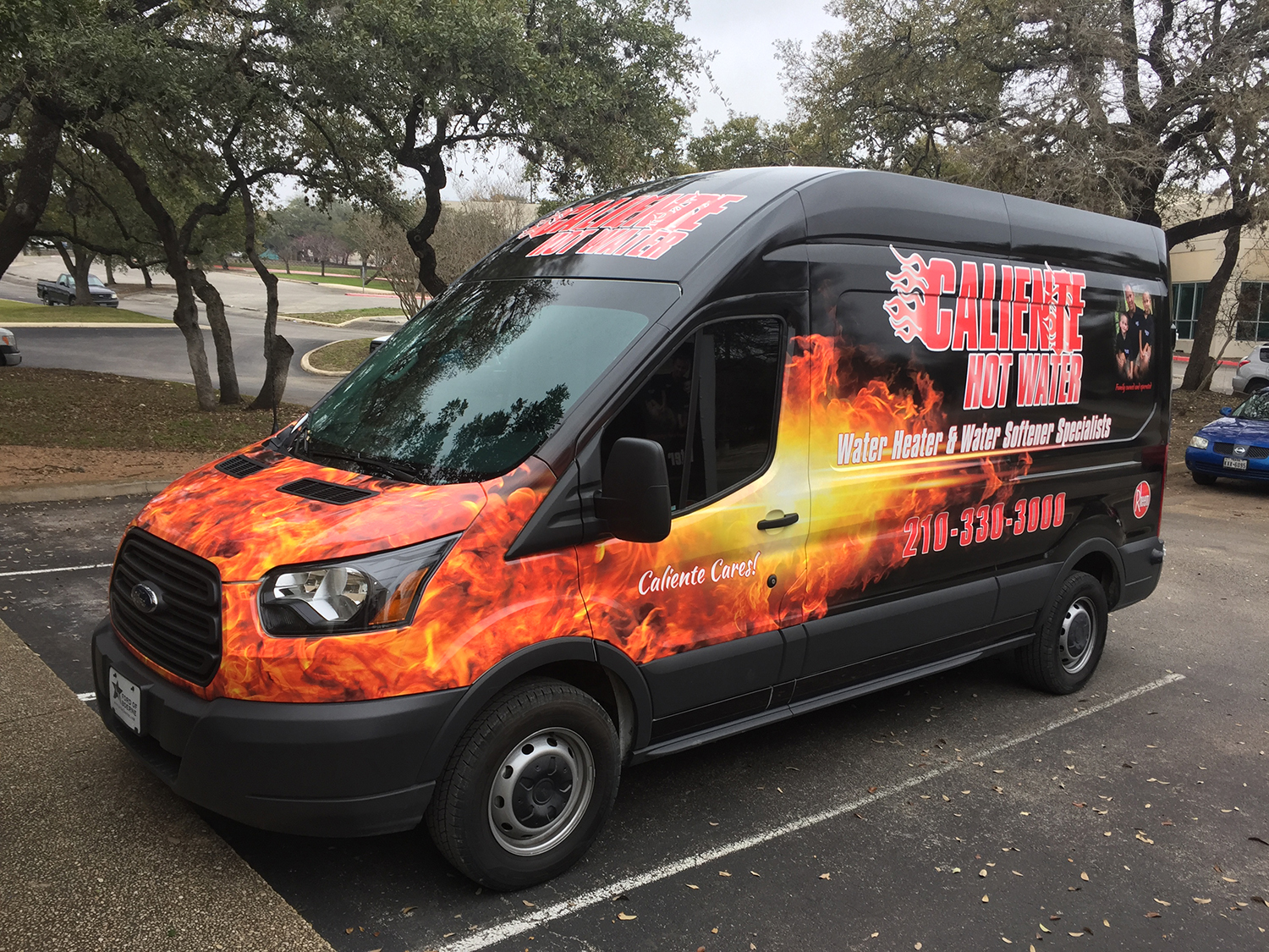 vehicle-car-wraps-graphics-caliente-hot-water-transit-van-wrap-flames