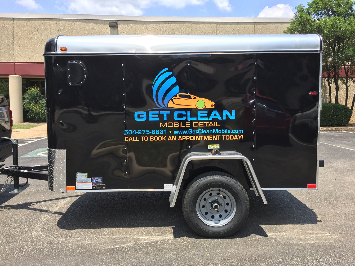 vehicle-car-wraps-graphics-cleaning-trailer